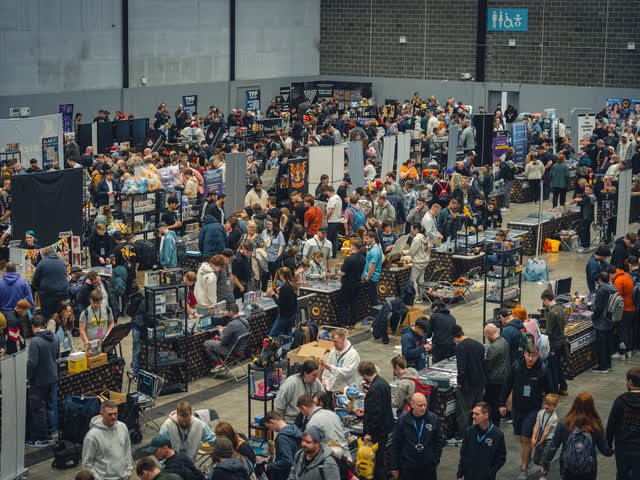 The hall at its busiest, aisles full from one wall to the other.