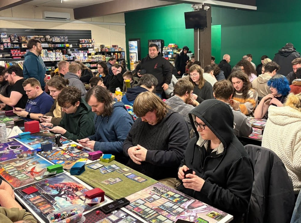 A packed games night at The Gamers Lodge, every table in play